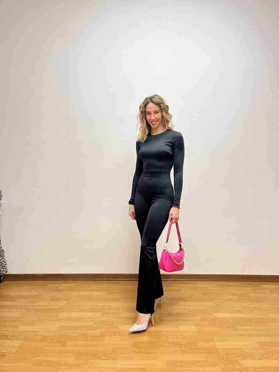 Tuta in lycra con pantaloni a zampa