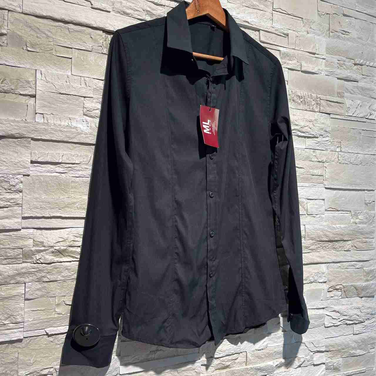 Camicia versa
