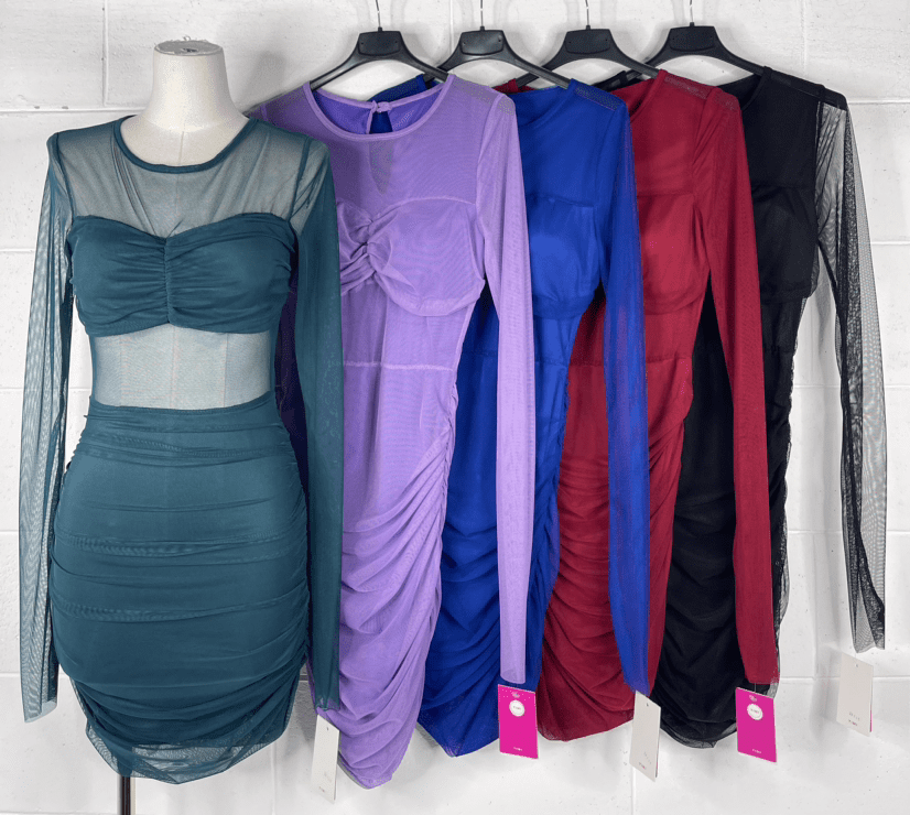 Abito in tulle con drappeggi