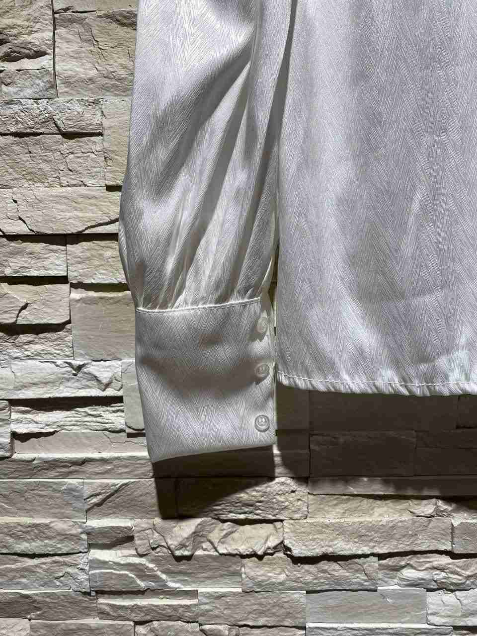 Blusa in raso scollata