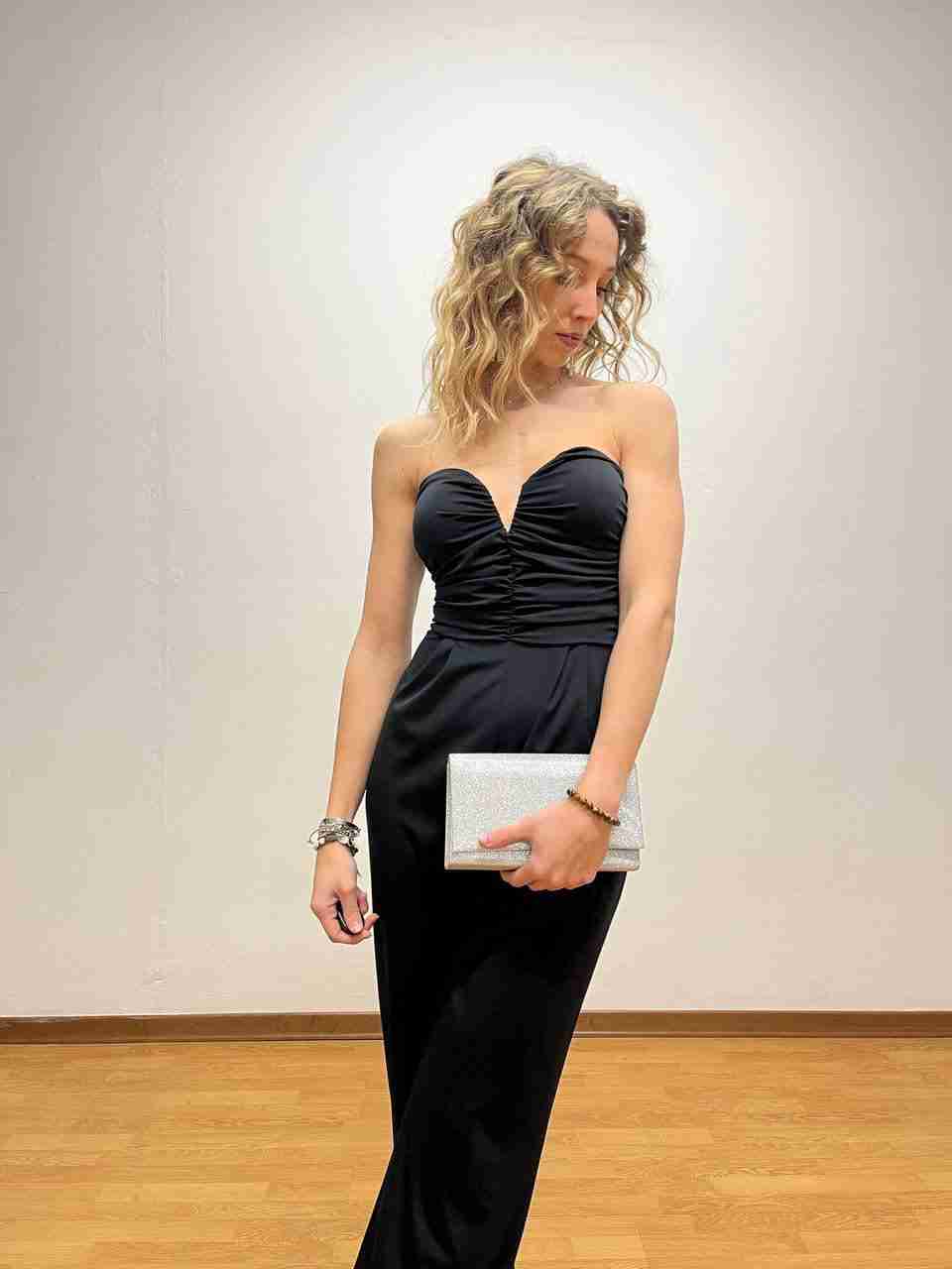 Tuta a corsetto e pantaloni a palazzo