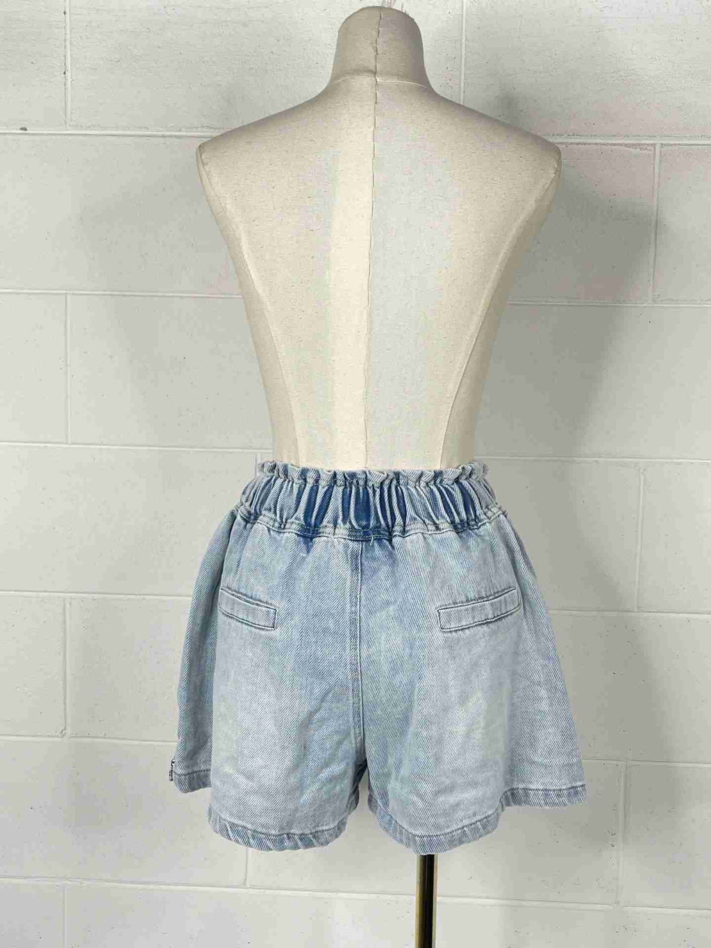 Shorts caramella con diamantini