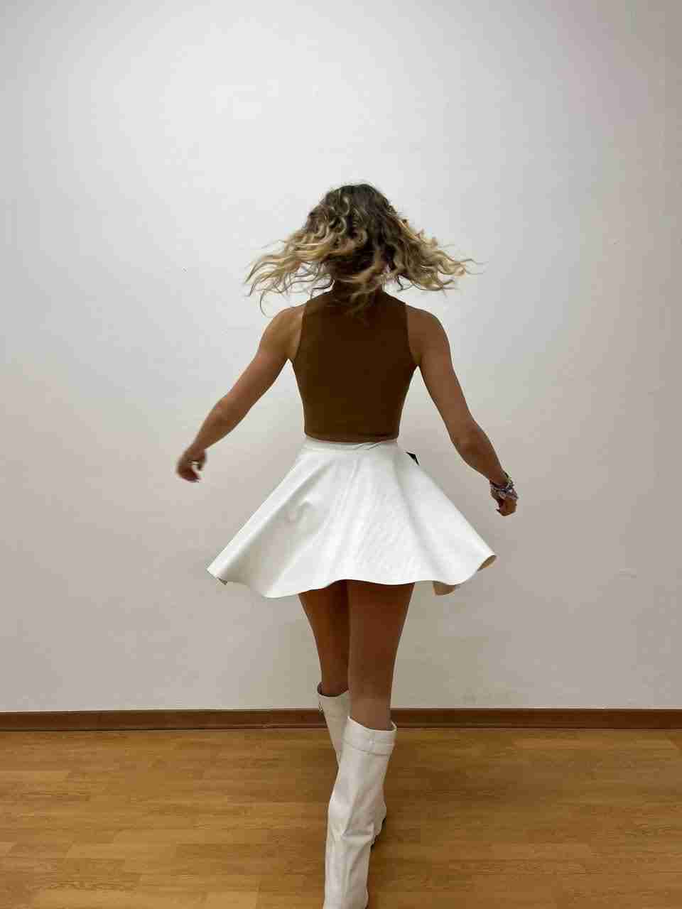 Body smanicato a dolcevita