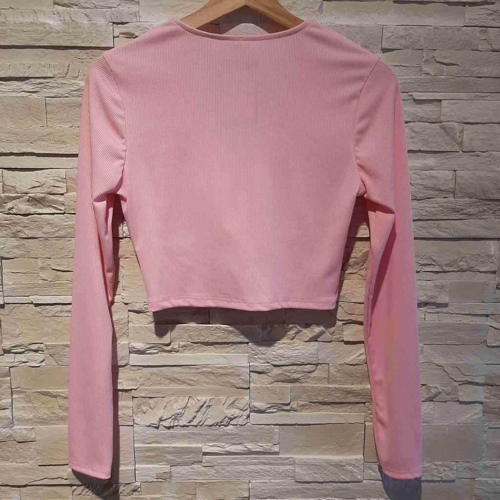 Top crop a costine con scollo a portafoglio