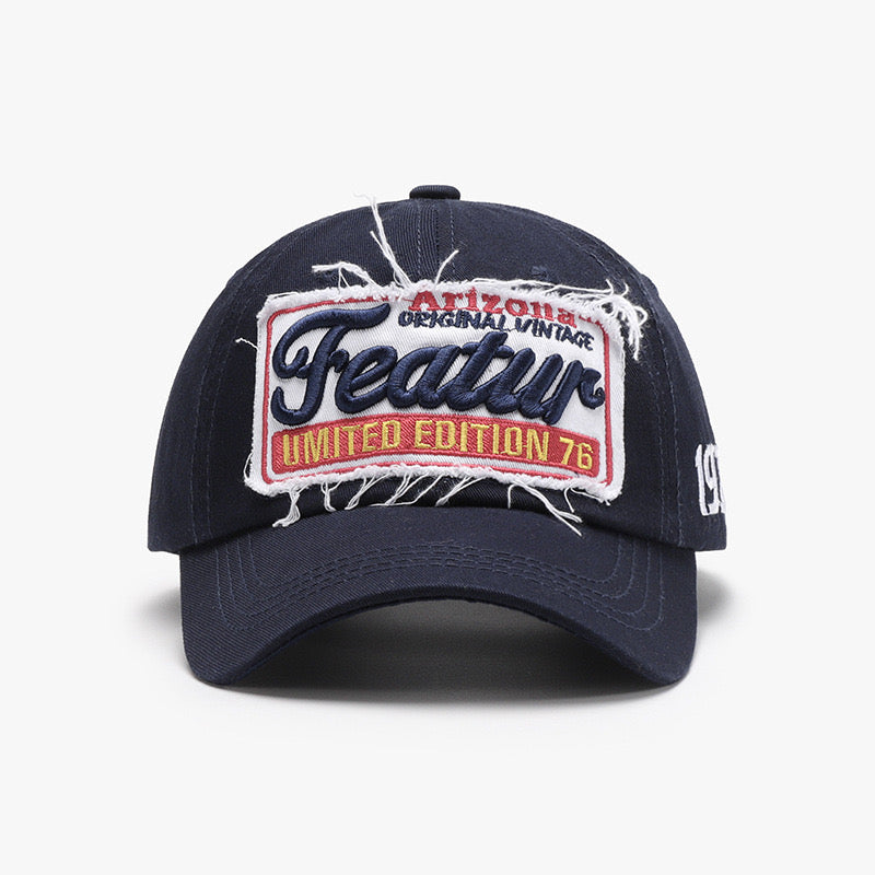 Cappellino featur