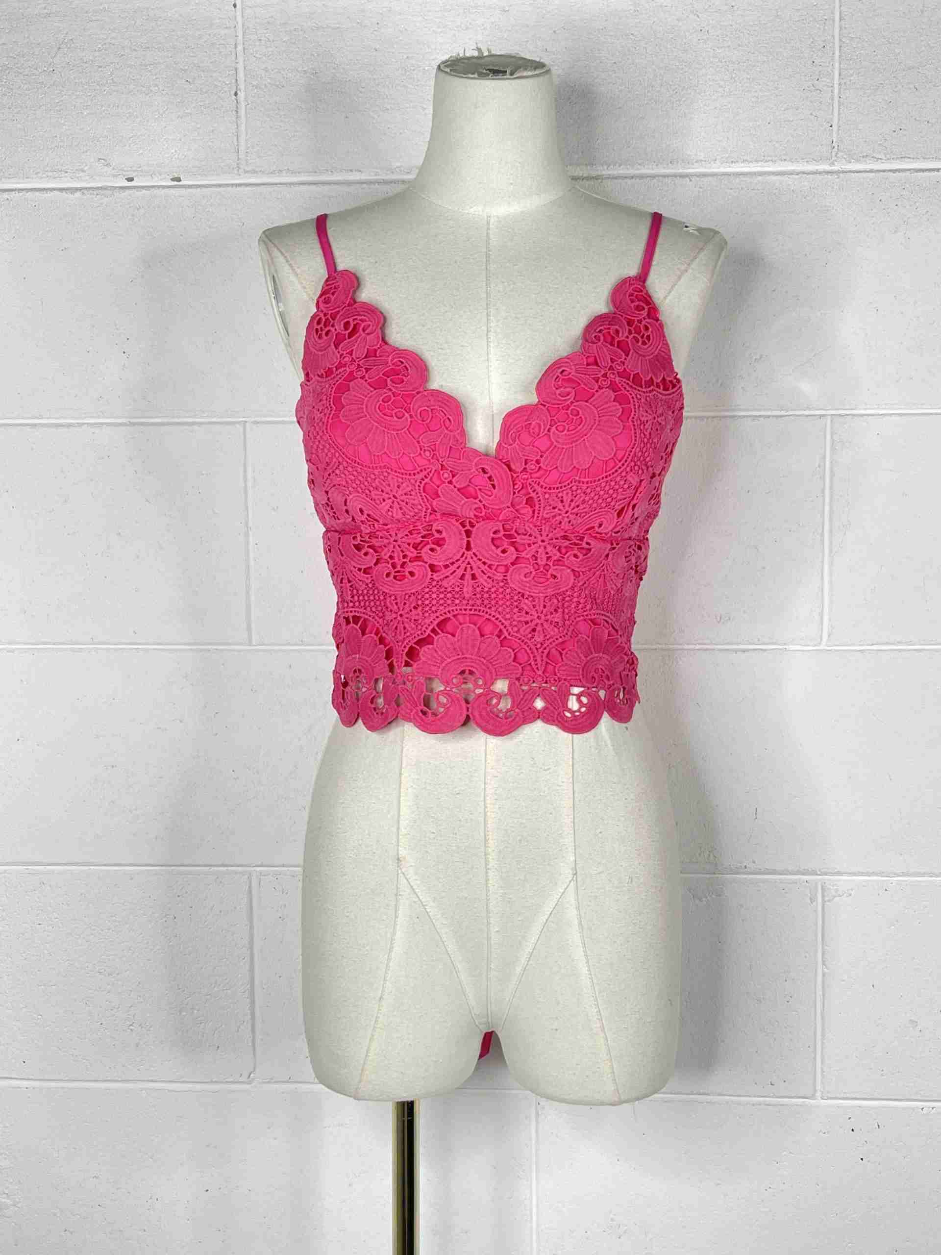 Top in pizzo con fiocco nella schiena
