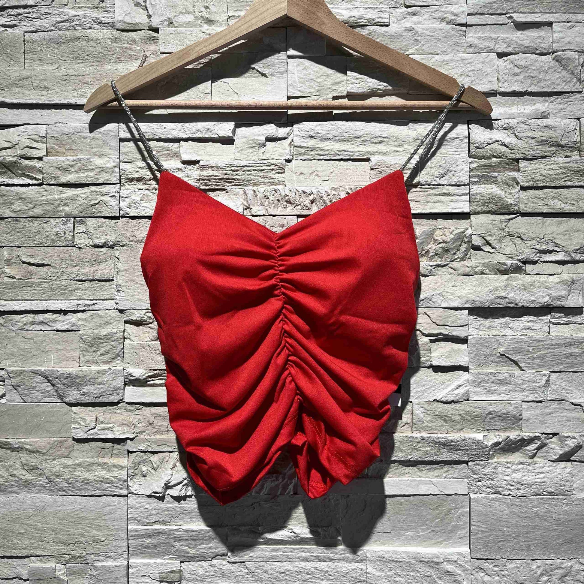 Top arricciato con spalline glitter