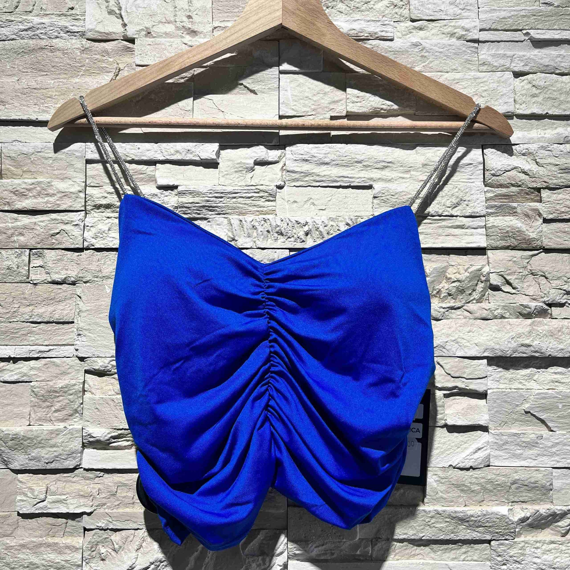 Top arricciato con spalline glitter