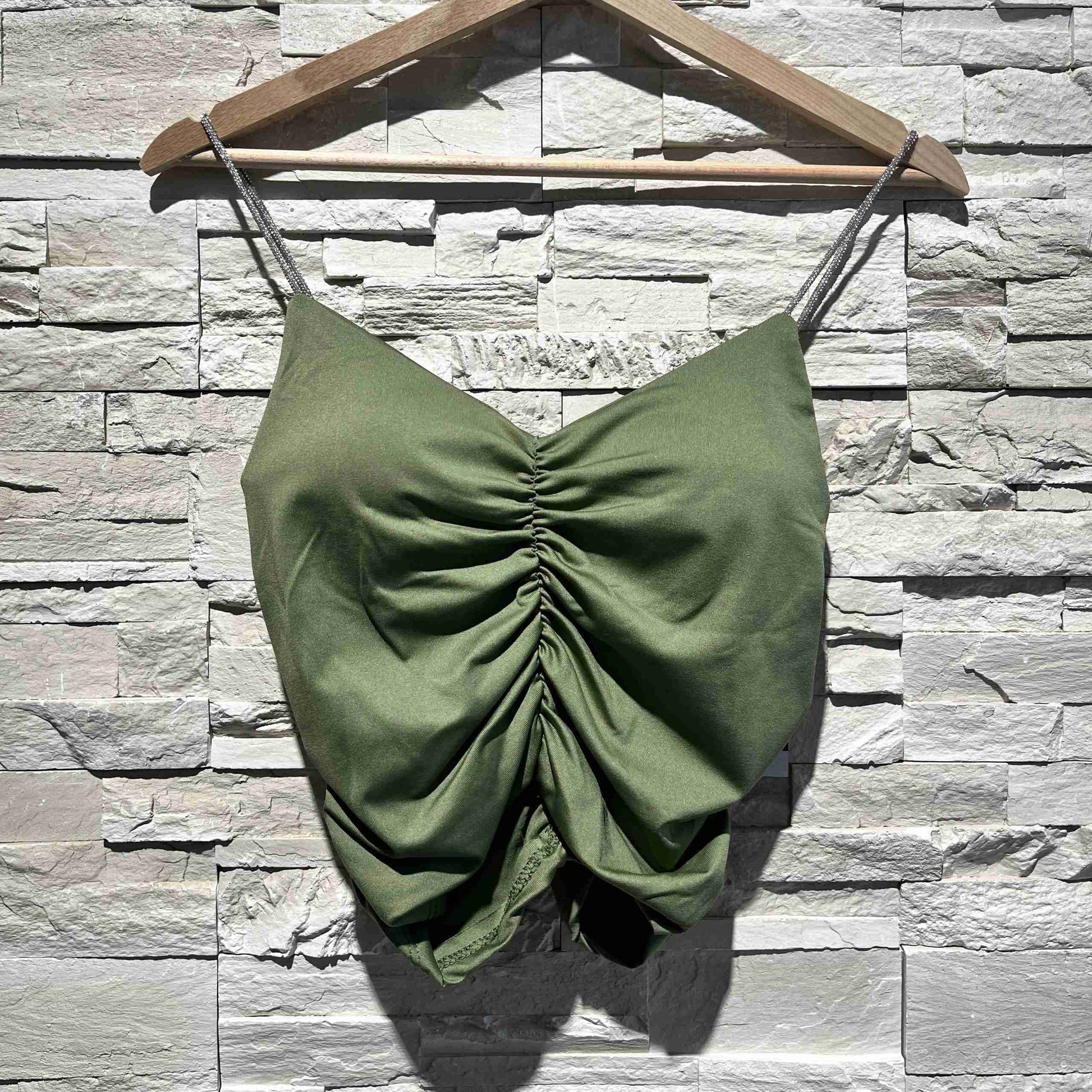 Top arricciato con spalline glitter