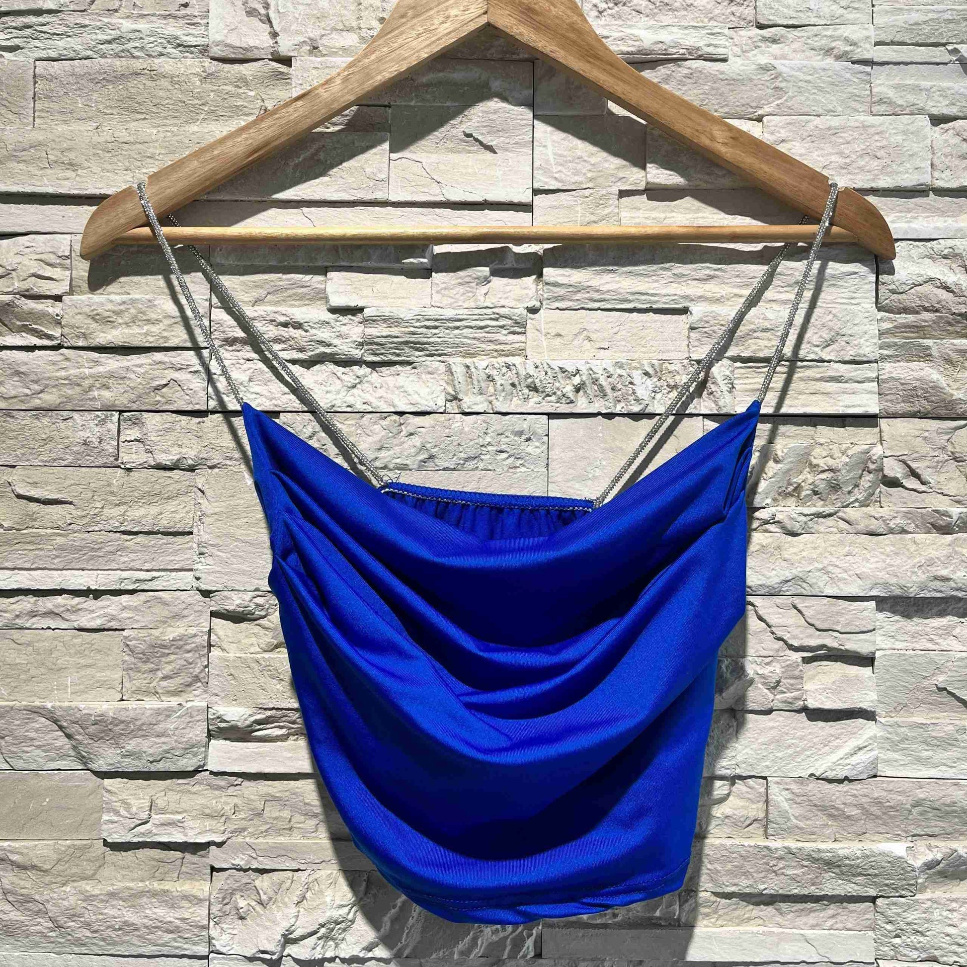 Top scollo drappeggiato e spalline glitter