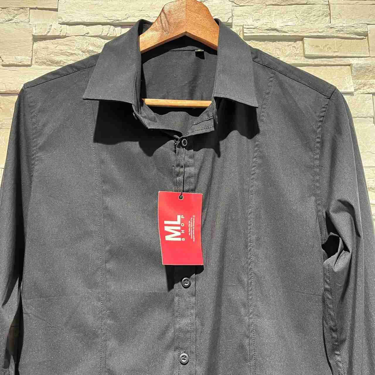 Camicia versa