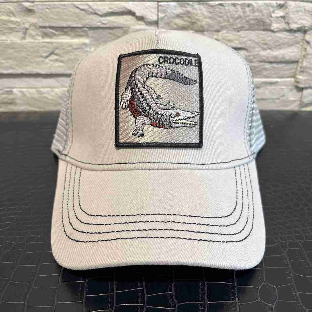 Cappellino crocodile