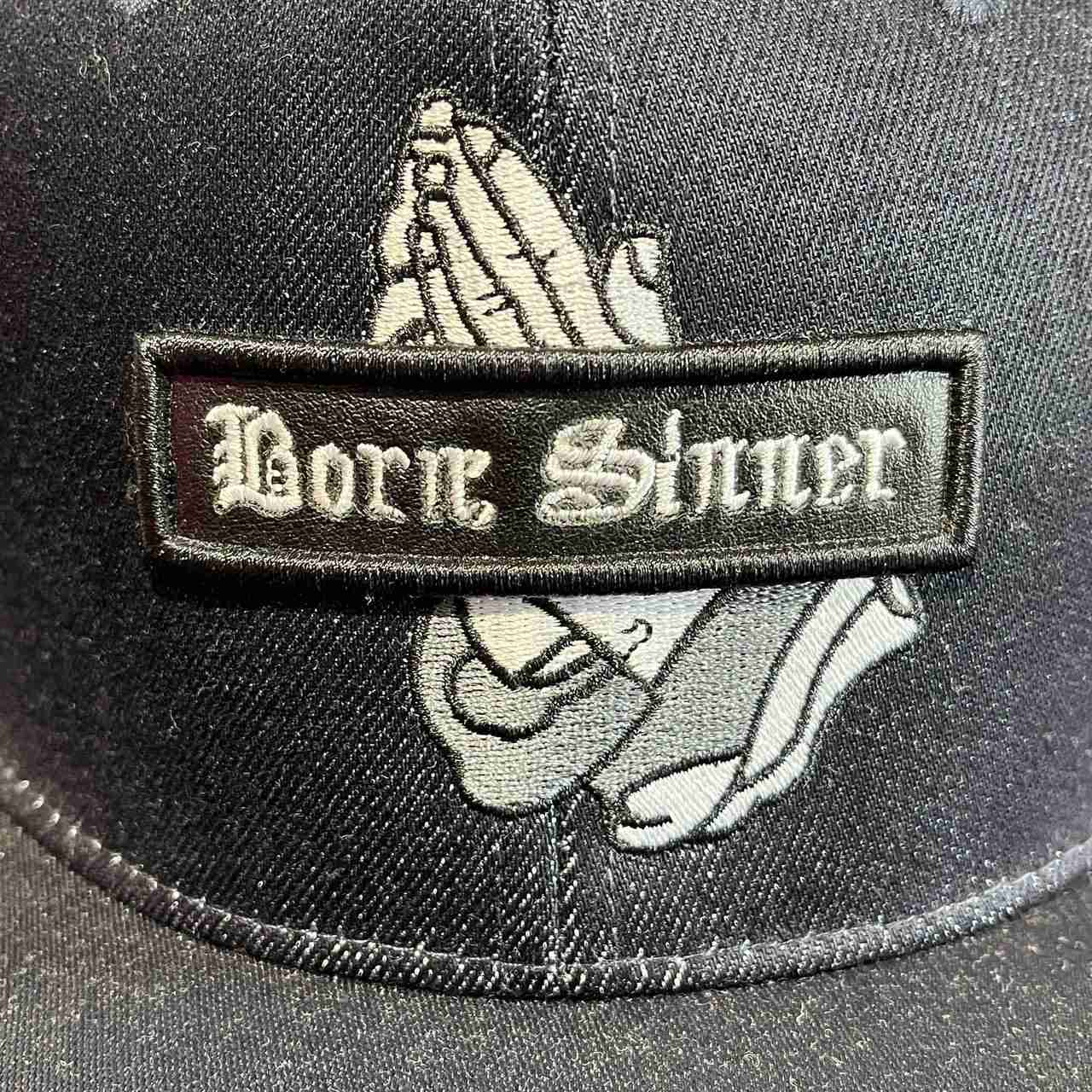 Cappellino sinner