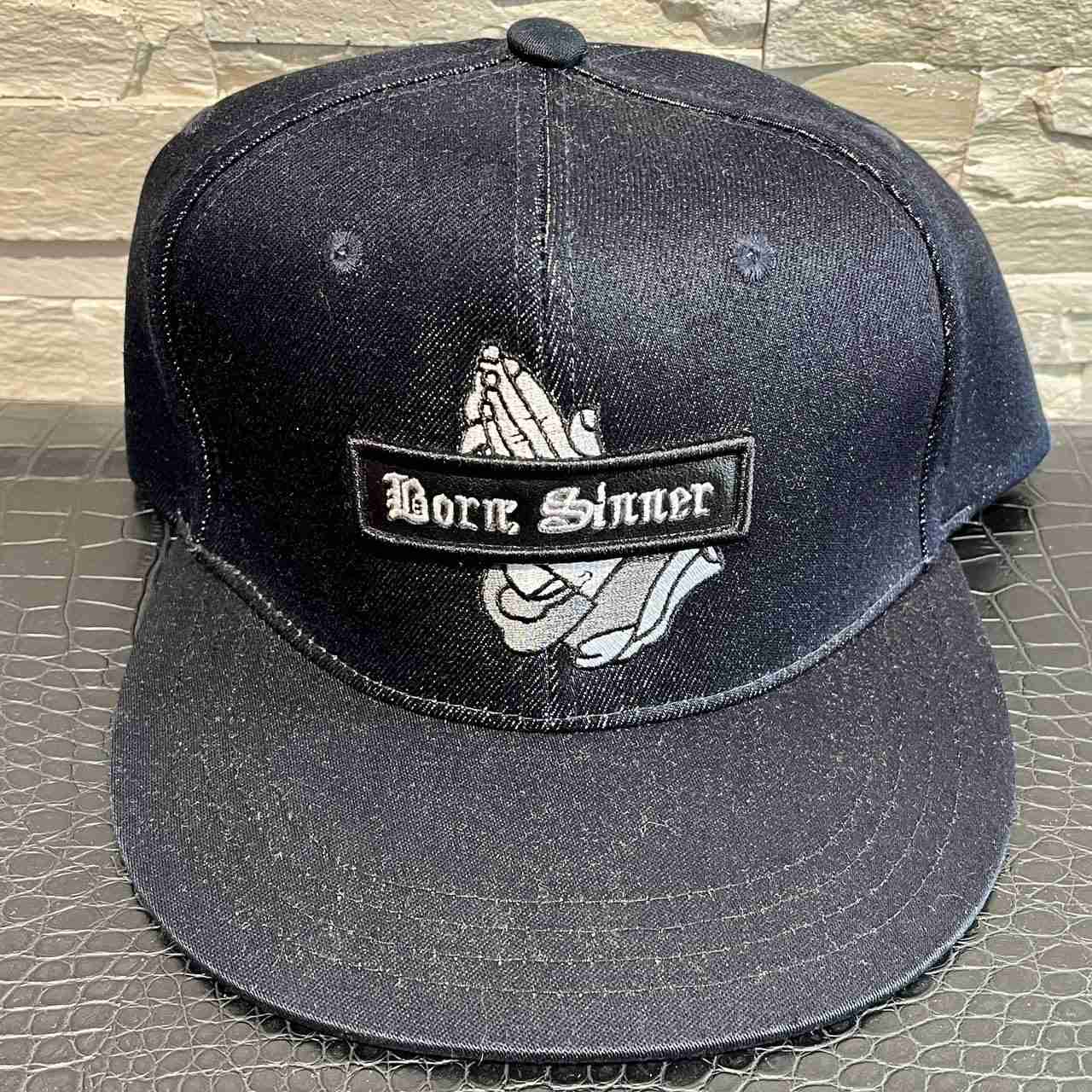 Cappellino sinner